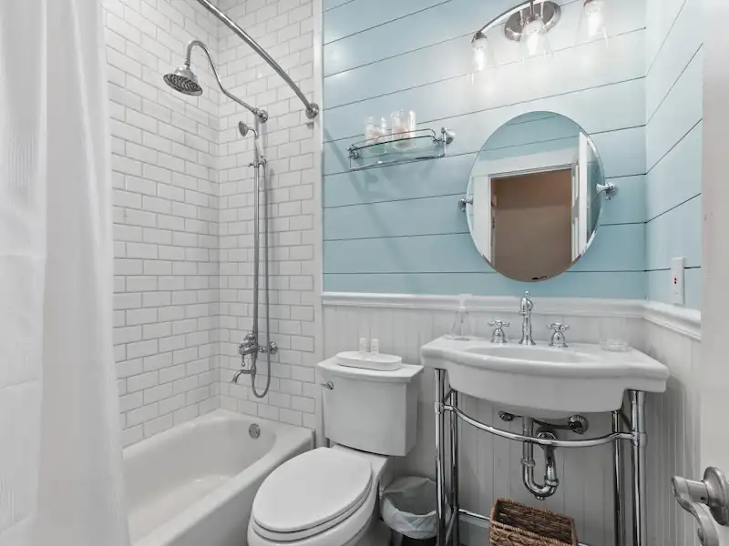 Suite 316A king bedroom with smart TV and dresser â€” Victorian District vacation rental Savannah